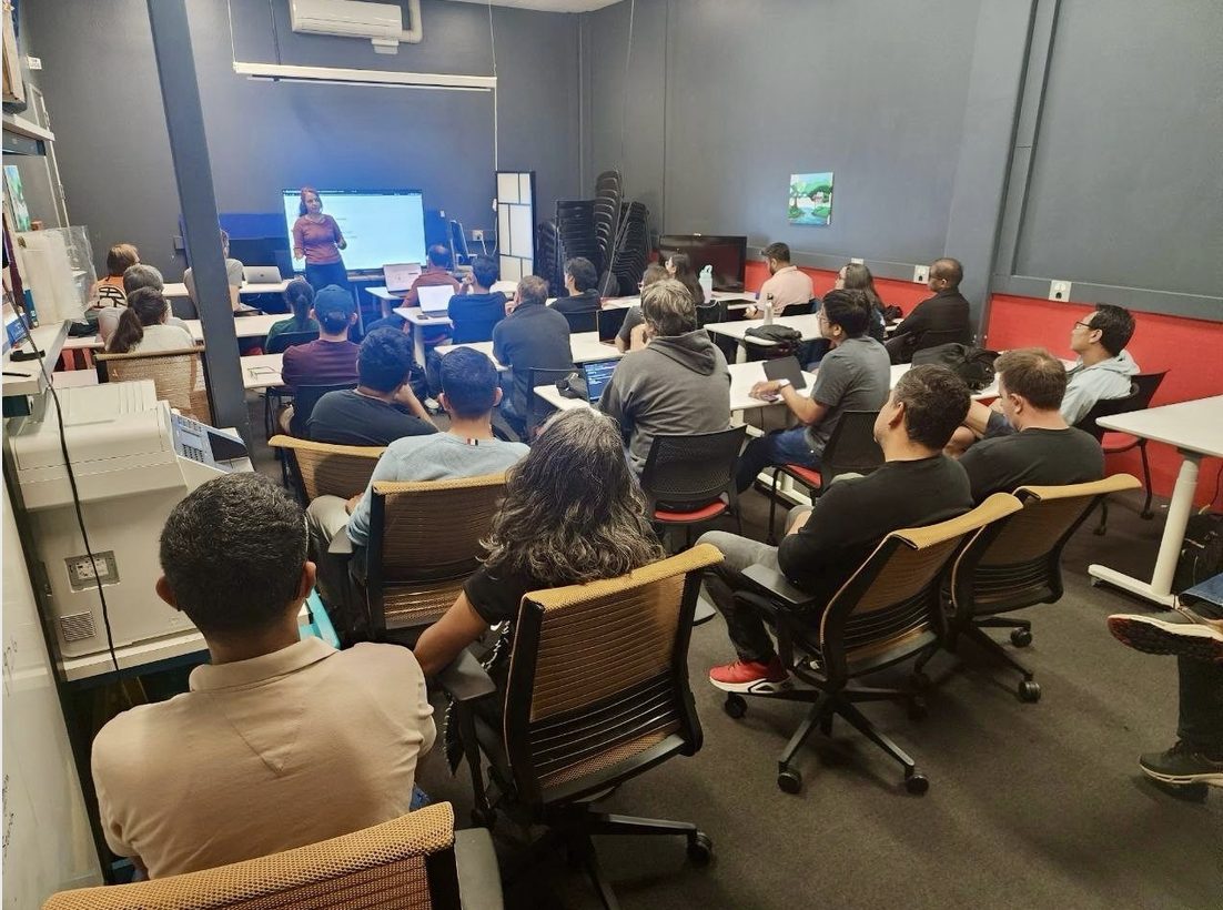 Arshi presenting to a full room at a Breaking Models session at Hacker Dojo